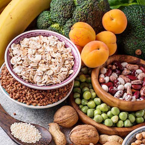 Natural L-Arginine food sources including oats, nuts, legumes, broccoli and apricots